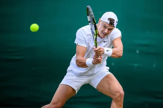 240704 Holger Rune of Denmark competes in a second round singles match during day 4 of Wimbledon on July 4, 2024 in London Photo Jesper Zerman BILDBYRAN kod JZ JZ0550 tennis wimbledon dag 4 bbeng  Copyright: JESPERxZERMAN BB240704JZ101