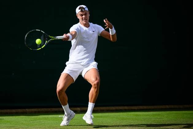 240704 Holger Rune of Denmark competes in a second round singles match during day 4 of Wimbledon on July 4, 2024 in London Photo Jesper Zerman BILDBYRAN kod JZ JZ0550 tennis wimbledon dag 4 bbeng  Copyright: JESPERxZERMAN BB240704JZ106
