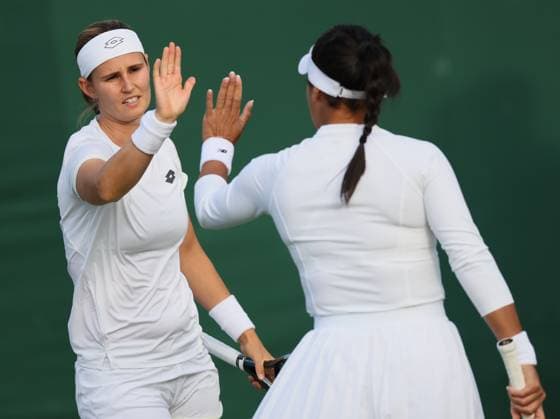Belgian Greet Minnen pictured during a doubles tennis match between Belgian-Great-Brittain pair Minnen-Watson and US pair Kenin-Mattek-Sands, in round 1 of the women s doubles of the 2024 Wimbledon grand slam tournament at the All England Tennis Club, in south-west London, Britain, Thursday 04 July 2024. BENOITxDOPPAGNE  x95830119x