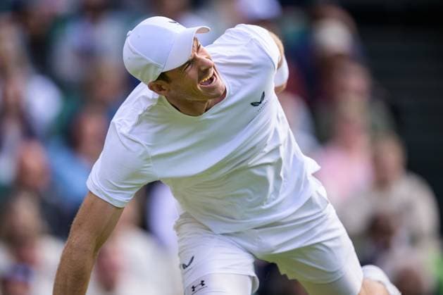 240704 Andy Murray of Great Britain in pain as he competes in a first round doubles match during day 4 of Wimbledon on July 4, 2024 in London Photo Jesper Zerman BILDBYRAN kod JZ JZ0550 tennis wimbledon dag 4 bbeng  Copyright: JESPERxZERMAN BB240704JZ114