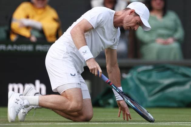 4th July 2024; All England Lawn Tennis and Croquet Club, London, England; Wimbledon Tennis Tournament, Day 4; Andy Murray (GBR) falls to the floor during his doubles match paired with brother Jamie against John Peers and Rinky Hijikata  ActionPlus12663834 ShaunxBrooks