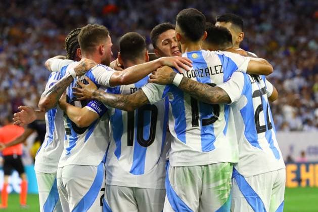 Argentina s defender Lisandro Martinez celebrates with teammates after scoring a goal against X during the Copa America USA 2024, quarterfinal match between Argentina and Ecuador, at NRG stadium in Houston, on July 4, 2024 HOUSTON UNITED STATES Copyright: xALEJANDROxPAGNIx