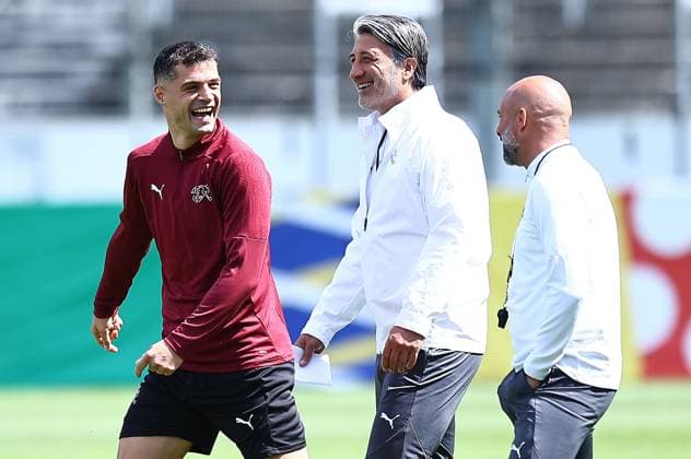 EURO 2024, Nationalteam Schweiz Training Granit Xhaka of Switzerland jokes with Switzerland manager Murat Yakin Switzerland Training, UEFA European Championship, EM, Europameisterschaft 2024, Quarter Final, Football, Stadion auf der Waldau, Stuttgart, Germany, 05 Jul 2024 EDITORIAL USE ONLY No use with unauthorised audio, video, data, fixture lists, club league logos or live services. Online in-match use limited to 120 images, no video emulation. No use in betting, games or single club league player publications. Copyright: xMichaelxZemanek Shutterstockx 14571352k