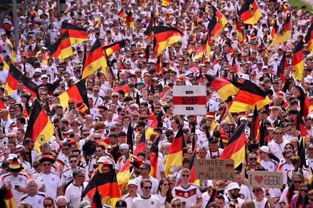 Fan march before the game, German fans, flags, flags, atmosphere, fan festival sign ONLY VFB STUTTGART EURO 2024 European Championship quarter-final Spain ESP vs Germany EURO 2024 European Championship quarter-final Spain ESP vs Germany