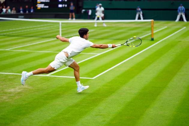 Carlos Alcaraz and Frances Tiafoe during their third round match Wimbledon Tennis Championships, Day 5, The All England Lawn Tennis and Croquet Club, London, UK - 05 Jul 2024  Copyright: xJavierxGarcia Shutterstockx 14571043i