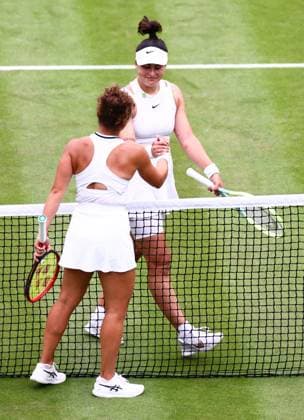 Jasmine Paolini of Italy is congratulated by Bianca Andreescu of Canada Wimbledon Tennis Championships, Day 5, The All England Lawn Tennis and Croquet Club, London, UK - 05 Jul 2024  Copyright: xJamesxMarsh Shutterstockx 14571051bb