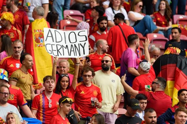 A fan of Spain holding a placard with Adios Germany before the UEFA EURO, EM, Europameisterschaft,Fussball 2024 quarter- final football match between Spain and Germany at Stuttgart Arena, Germany. (Sven Beyrich SPP)  Copyright: xSvenxBeyrich SPPx spp-en-SvBe-20240705-D4S_5000