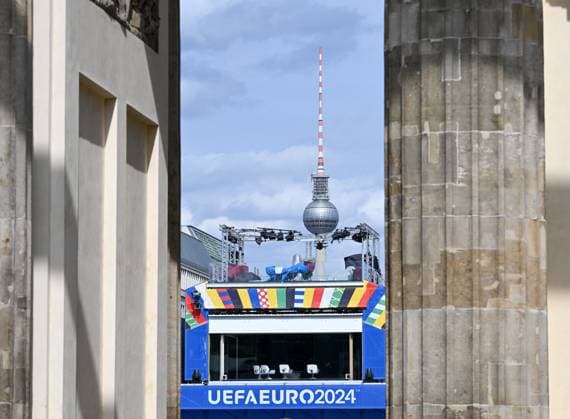 Berlin, Germany 5 July 2024 European Football Championship 2024 In the picture The headquarters for the Brandenburger Tor fan zone and the television tower through the Brandenburger Tor Copyright: xFotostandx xReuhlx