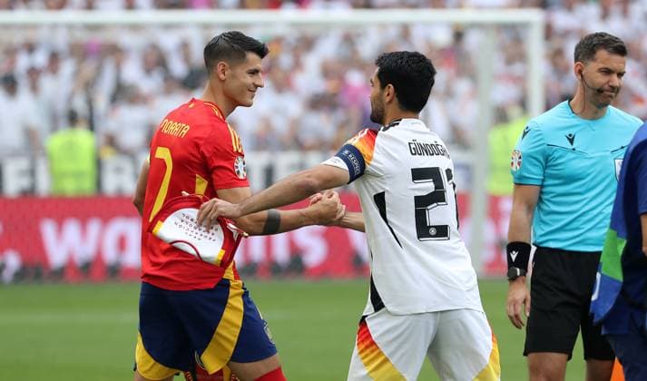Daniel Carvajal greets Ilkay Gündogan before the start of the match, side selection Sport Football Soccer European Championship Euro 2024 European Championship Quarterfinals Men Season 2023 2024 05 07 2024 Spain ESP vs Germany GER in Stuttgart DFL regulations prohibit any use of photographs as image sequences and or quasi video