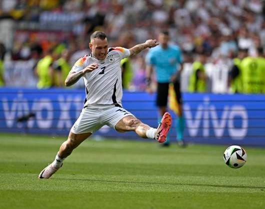 05 07 2024, Football UEFA EURO 2024, quarter-finals, Spain Germany, in the Stuttgart Arena David Raum Germany on the ball