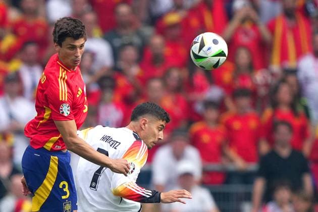 Spain s Robin Le Normand fight for the ball with Germany s Kai Havertz during the Euro 2024 soccer match between Spain and Germany at the Stuttgart Arena , Stuttgart , Germany - Friday 05 july 2024. - Soccer .  Copyright: xSpada LaPressex