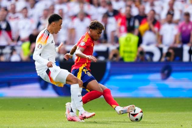 Spain v Germany: Quarter-Final - UEFA EURO, EM, Europameisterschaft,Fussball 2024 Lamine Yamal right winger of Spain and FC Barcelona, Barca and Jamal Musiala attacking midfield of Germany and Bayern Munich compete for the ball during the UEFA EURO 2024 quarter-final match between Spain and Germany at Stuttgart Arena on July 5, 2024 in Stuttgart, Germany. Stuttgart Germany  Copyright: xJosexBretonx originalFilename:bretonhernandez-spainvge240705_npC9U.jpg