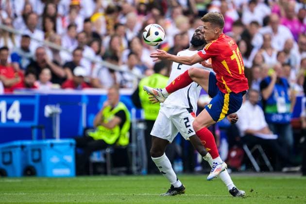 240705 Antonio Ruediger of Germany and Daniel Olmo of Spain during the UEFA Euro 2024 Football Championship quarterfinal between Spain and Germany on July 5, 2024 in Stuttgart Photo Mathias Bergeld BILDBYRAN kod MB MB0942 fotboll, football, soccer, fotball, fotbolls em, europamästersk  Copyright: MATHIASxBERGELD BB240705MB033