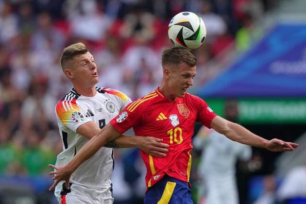 Spain s Dani Olmo fight for the ball with Germany s Toni Kroos during the Euro 2024 soccer match between Spain and Germany at the Stuttgart Arena , Stuttgart , Germany - Friday 05 july 2024. - Soccer .  Copyright: xSpada LaPressex