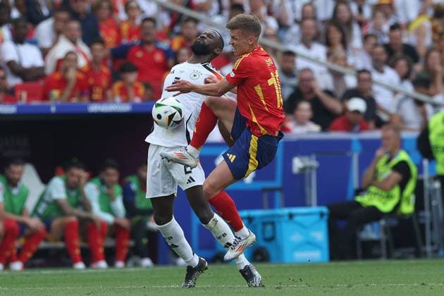 Soccer UEFA EURO 2024 Quarterfinal Spain Germany on 05 07 2024 at the Stuttgart Arena in Stuttgart Antonio Rüdiger Germany , left Dani Olmo Spain , right xMSx