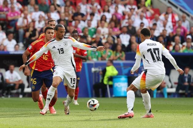 in duel, action, with Rodri 16 Spain , Leroy Sane 19 Germany , Jamal Musiala 10 Germany , Spain vs. Germany, Football, UEFA Euro 2024, Quarterfinals, 05 07 2024 Stuttgart Baden Wuerttemberg Germany Copyright: xkolbert-press ChristianxKolbertx