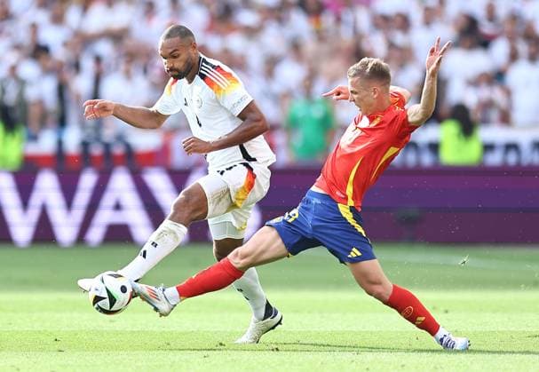 Jonathan Tah of Germany is challenged by Dani Olmo of Spain Spain v Germany, UEFA European Championship, EM, Europameisterschaft 2024, Quarter Final, Football, Stuttgart Arena, Stuttgart, Germany, 05 Jul 2024 EDITORIAL USE ONLY No use with unauthorised audio, video, data, fixture lists, club league logos or live services. Online in-match use limited to 120 images, no video emulation. No use in betting, games or single club league player publications. Copyright: xMichaelxZemanek Shutterstockx 14571380bd