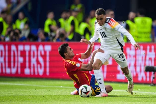 240705 Rodrigo Hernandez of Spain and Jamal Musiala of Germany during the UEFA Euro 2024 Football Championship quarterfinal between Spain and Germany on July 5, 2024 in Stuttgart Photo Mathias Bergeld BILDBYRAN code MB MB0942 fotboll football soccer fotballs em europamästerskap em uefa euro uefa european football championship euro 2024 kvartfinal quarterfinal quarterfinals spanien spain deutschland germany bbeng bbauto  Copyright: MATHIASxBERGELD BB240705MB039