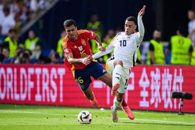 240705 Rodrigo Hernandez of Spain and Jamal Musiala of Germany during the UEFA Euro 2024 Football Championship quarterfinal between Spain and Germany on July 5, 2024 in Stuttgart Photo Mathias Bergeld BILDBYRAN code MB MB0942 fotboll football soccer fotballs em europamästerskap em uefa euro uefa european football championship euro 2024 kvartfinal quarterfinal quarterfinals spanien spain deutschland germany bbeng bbauto  Copyright: MATHIASxBERGELD BB240705MB040
