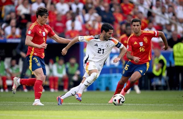 Soccer Euro 2024 quarterfinals 05 07 2024 Spain Germany Robin Le Normand left, Spain vs Ilkay Guendogan center, Germany vs Rodri right, Spain