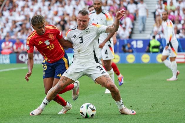 Euro 2024 Spain Germany on 05 07 2024 in the Stuttgart Arena in Stuttgart Lamine Yamal Spain 19 vs David Raum Germany 3 MH