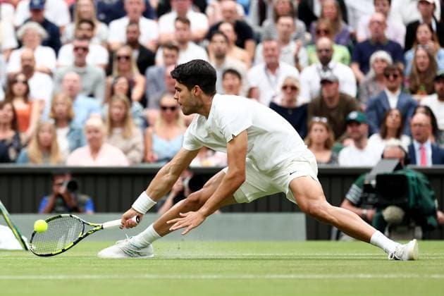 5th July 2024; All England Lawn Tennis and Croquet Club, London, England; Wimbledon Tennis Tournament, Day 5; Carlos Alcaraz (ESP) in action during his third round match against Frances Tiafoe (USA)  ActionPlus12664213 ShaunxBrooks