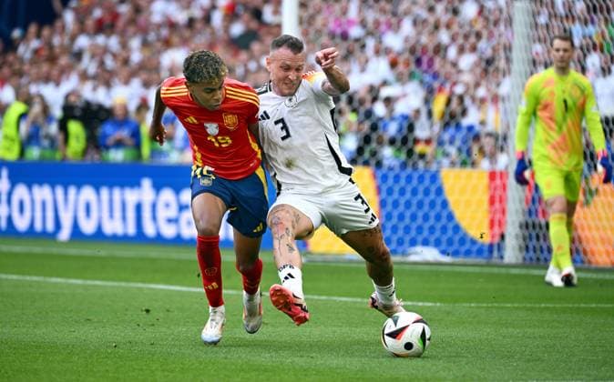 Football, European Championship, EURO 2024, Quarter-finals, MHP Arena Stuttgart Spain Germany Lamine Yamal SPA , David Raum GER Action