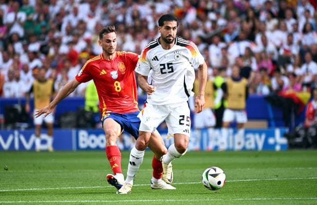 Football, European Championship, EURO 2024, Quarter-final, MHP Arena Stuttgart Spain Germany Emre Can GER , Fabian Ruiz SPA Action