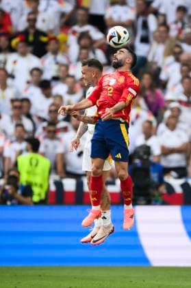 Spain v Germany - UEFA EURO, EM, Europameisterschaft,Fussball 2024 Dani Carvajal of Spain competes for the ball with David Raum of Germany during the UEFA EURO 2024 quarter-final football match between Spain and Germany. Stuttgart Germany Copyright: xNicolòxCampox
