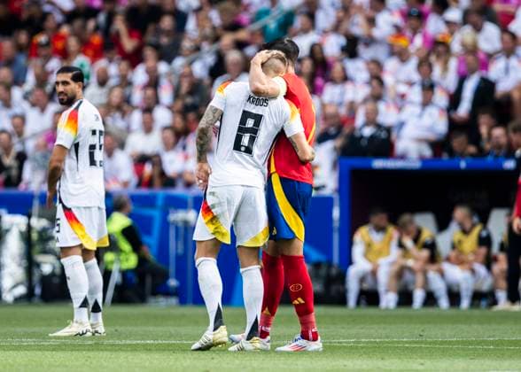 Stuttgart, MHPArena 05 07 2024 Alvaro Morata of spain R hugs Toni Kroos of germany during the quarterfinal match Spain v Germany at the UEFA European Championship 2024
