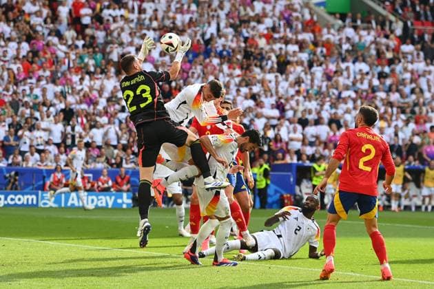 Penalty area scene with GOALKEEPER Unai SIMON ESP , Kai HAVERTZ GER , Ilkay Guendogan GER , Antonio Ruediger GER , Action, Quarterfinal Spain ESP Germany GER on 05 07 2024,Stuttgart Arena, Football UEFA EURO 2024 GERMANY from 14 06 2024 14 07 2024 Â