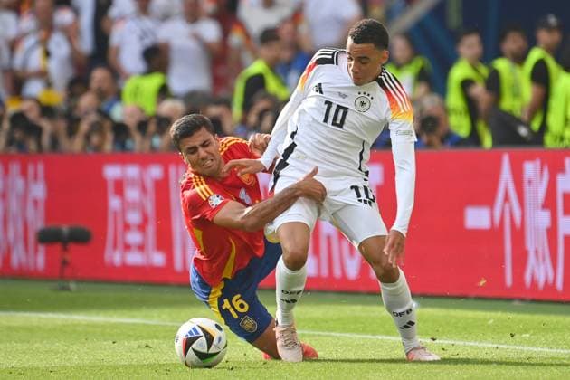Jamal MUSIALA GER , action,duel against RODRI ESP quarterfinal Spain ESP Germany GER on 05 07 2024,Stuttgart Arena, Football UEFA EURO 2024 GERMANY from 14 06 2024 14 07 2024