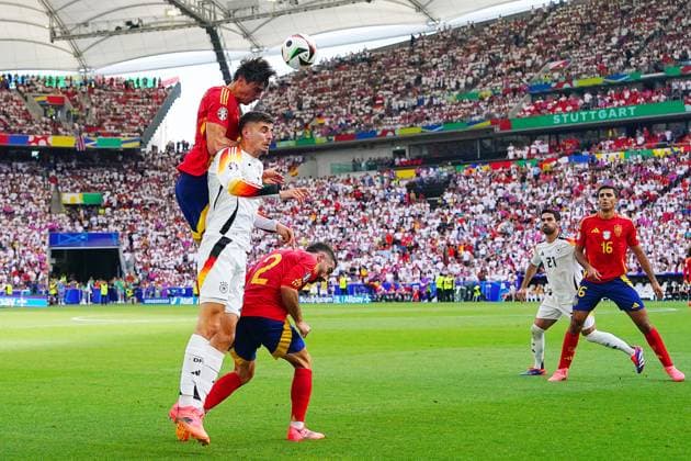 Spain s Robin Le Normand fight for the ball with Germany s Kai Havertz during the Euro 2024 soccer match between Spain and Germany at the Stuttgart Arena , Stuttgart , Germany - Friday 05 july 2024. - Soccer .  Copyright: xSpada LaPressex