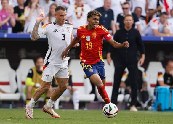 Spain v Germany: Quarter-Final - UEFA EURO, EM, Europameisterschaft,Fussball 2024 David Raum of Germany and Lamine Yamal of Spain challenge during the UEFA EURO 2024 quarter-final match between Spain and Germany at Stuttgart Arena on July 5, 2024 in Stuttgart, Germany. Stuttgart Stuttgart Arena Germany Germany Copyright: xRichardxSellers Sportsphoto APLx 14044167