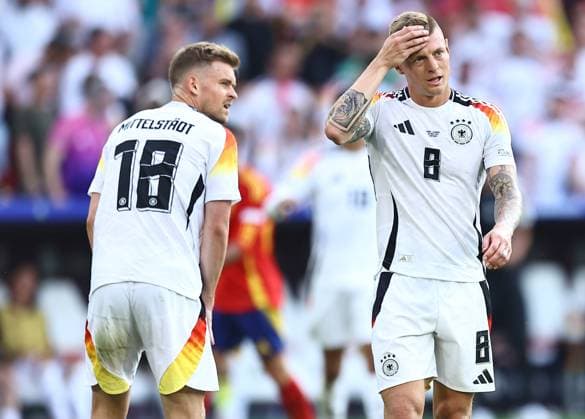 Toni Kroos of Germany and Maximilian Mittelstädt of Germany react Spain v Germany, UEFA European Championship, EM, Europameisterschaft 2024, Quarter Final, Football, Stuttgart Arena, Stuttgart, Germany, 05 Jul 2024 EDITORIAL USE ONLY No use with unauthorised audio, video, data, fixture lists, club league logos or live services. Online in-match use limited to 120 images, no video emulation. No use in betting, games or single club league player publications.  Copyright: xMichaelxZemanek Shutterstockx 14571380cd