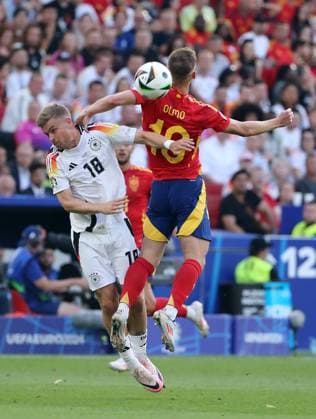 Maximilian Mittelstädt in a duel with Dani Olmo Match scene Action Sport Football European Championship Euro 2024 European Championship quarter-finals mens season 2023 2024 05 07 2024 Spain ESP vs Germany GER in Stuttgart DFL regulations prohibit any use of photographs as image sequences and or quasi video