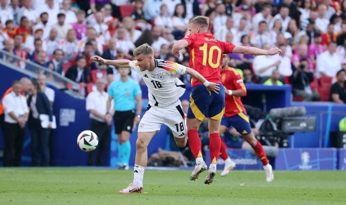 Maximilian Mittelstädt in a duel with Dani Olmo Match scene Action Sport Football European Championship Euro 2024 European Championship quarter-finals mens season 2023 2024 05 07 2024 Spain ESP vs Germany GER in Stuttgart DFL regulations prohibit any use of photographs as image sequences and or quasi video