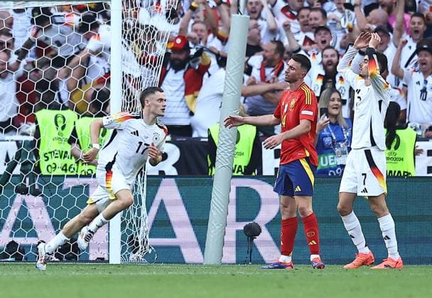 Florian Wirtz of Germany celebrates scoring a goal to make it 1-1 Spain v Germany, UEFA European Championship, EM, Europameisterschaft 2024, Quarter Final, Football, Stuttgart Arena, Stuttgart, Germany, 05 Jul 2024 EDITORIAL USE ONLY No use with unauthorised audio, video, data, fixture lists, club league logos or live services. Online in-match use limited to 120 images, no video emulation. No use in betting, games or single club league player publications. Copyright: xMichaelxZemanek Shutterstockx 14571380cl