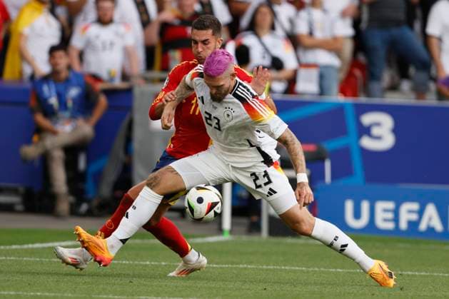 Spain v Germany: Quarter-Final - UEFA EURO, EM, Europameisterschaft,Fussball 2024 Ferran Torres of Spain and Robert Andrich of Germany challenge during the UEFA EURO 2024 quarter-final match between Spain and Germany at Stuttgart Arena on July 5, 2024 in Stuttgart, Germany. Stuttgart Stuttgart Arena Germany Germany Copyright: xRichardxSellers Sportsphoto APLx 14044185