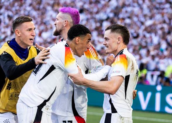 Stuttgart, MHPArena 05 07 2024 Florian Wirtz of germany R celebrates scoring the 1 1 goal with Jamal Musiala of germany during the quarterfinal match Spain v Germany at the UEFA European Championship 2024