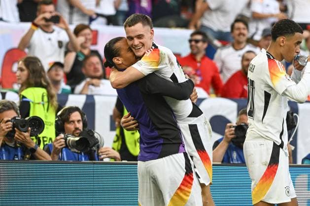 05 07 2024, xpsx, Football EM 2024 1 4 Final, Germany Spain emspor, v l Leroy Sane Germany, 19 , Florian Wirtz Germany, 17 Jubel, Torjubel, jubelt ueber das Tor, celebrate the goal, celebration DFL DFB REGULATIONS PROHIBIT ANY USE OF PHOTOGRAPHS as IMAGE SEQUENCES and or QUASI VIDEO Stuttgart
