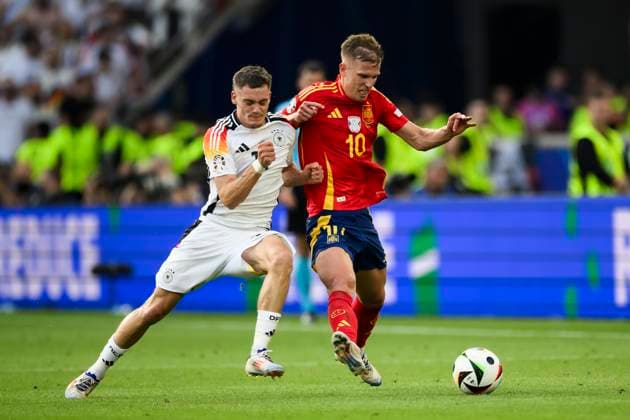Spain v Germany - UEFA EURO, EM, Europameisterschaft,Fussball 2024 Dani Olmo of Spain competes for the ball with Florian Wirtz of Germany during the UEFA EURO 2024 quarter-final football match between Spain and Germany. Stuttgart Germany Copyright: xNicolòxCampox