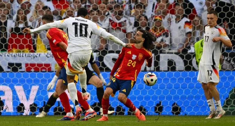 05 07 2024, xsltx, Football EM 2024 1 4 Final, Germany Spain emspor, v l Jamal Musiala Germany , Marc Cucurella Spain Handball is not checked DFL DFB REGULATIONS PROHIBIT ANY USE OF PHOTOGRAPHS as IMAGE SEQUENCES and or QUASI VIDEO Stuttgart
