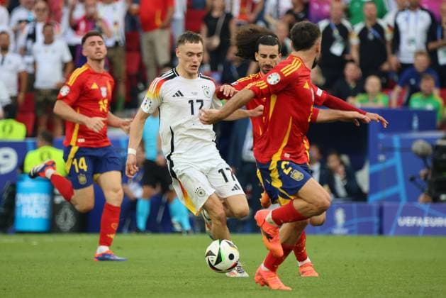 05 07 2024, Football, Men, UEFA European Championship 2024, Quarter Final, Quarter Final, Spain Germany, Florian Wirtz Germany , Daniel Carvajal Spain , Aymeric Laporte Spain , Marc Cucurella Spain Stuttgart MHP Arena Baden Württemberg Germany EN Copyright: xSebastianxBachx