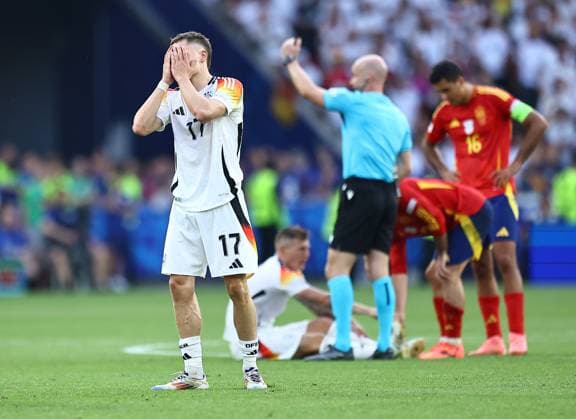 Florian Wirtz of Germany reacts Spain v Germany, UEFA European Championship, EM, Europameisterschaft 2024, Quarter Final, Football, Stuttgart Arena, Stuttgart, Germany, 05 Jul 2024 EDITORIAL USE ONLY No use with unauthorised audio, video, data, fixture lists, club league logos or live services. Online in-match use limited to 120 images, no video emulation. No use in betting, games or single club league player publications.  Copyright: xMichaelxZemanek Shutterstockx 14571380cy