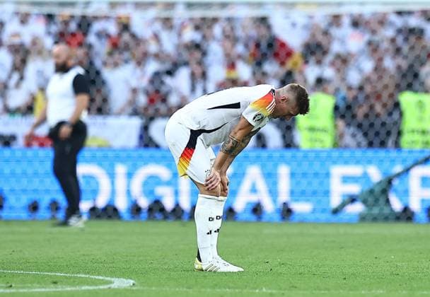Toni Kroos of Germany shows a look of dejection at full time Spain v Germany, UEFA European Championship, EM, Europameisterschaft 2024, Quarter Final, Football, Stuttgart Arena, Stuttgart, Germany, 05 Jul 2024 EDITORIAL USE ONLY No use with unauthorised audio, video, data, fixture lists, club league logos or live services. Online in-match use limited to 120 images, no video emulation. No use in betting, games or single club league player publications. Copyright: xMichaelxZemanek Shutterstockx 14571380dm