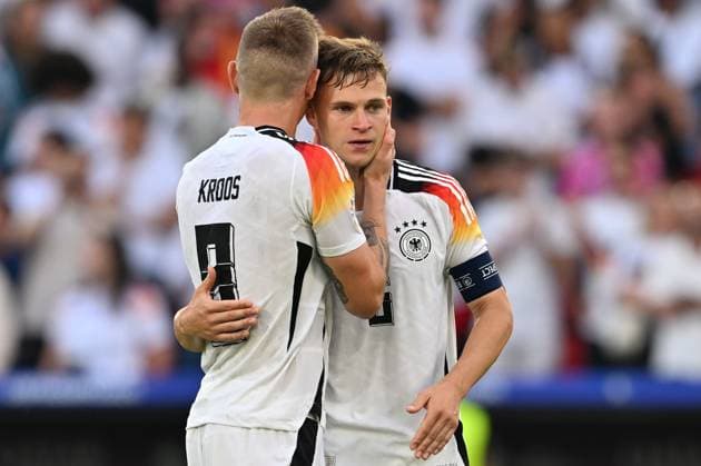 240705 EURO2024 SPAIN VS GERMANY Toni Kroos (8) of Germany and Joshua Kimmich (6) of Germany looking dejected and disappointed after losing a soccer game between the national teams of Spain and Germany in the Quarter Final stage of the UEFA EURO, EM, Europameisterschaft,Fussball 2024 tournament , on Friday 5 July 2024 in Stuttgart , Germany . PHOTO SPORTPIX David Catry STUTTGART GERMANY  Copyright: xx 472157