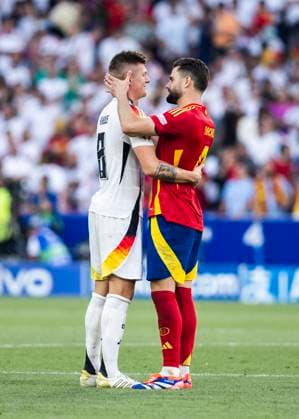 Stuttgart, MHPArena 05 07 2024 Nacho of spain comforts Toni Kroos of germany during the quarterfinal match Spain v Germany at the UEFA European Championship 2024