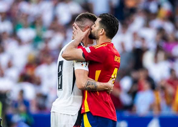 Stuttgart, MHPArena 05 07 2024 Nacho of spain comforts Toni Kroos of germany during the quarterfinal match Spain v Germany at the UEFA European Championship 2024