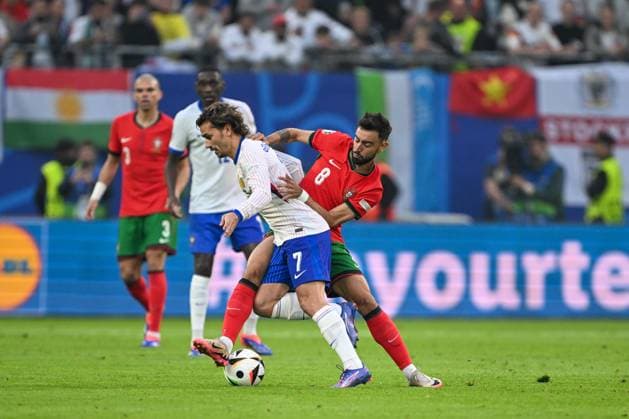 Euro 2024 Portugal France on 05 07 2024 at the Volksparkstadion in Hamburg Antoine Griezmann 7 of France and Bruno Fernandes 8 of Portugal MT